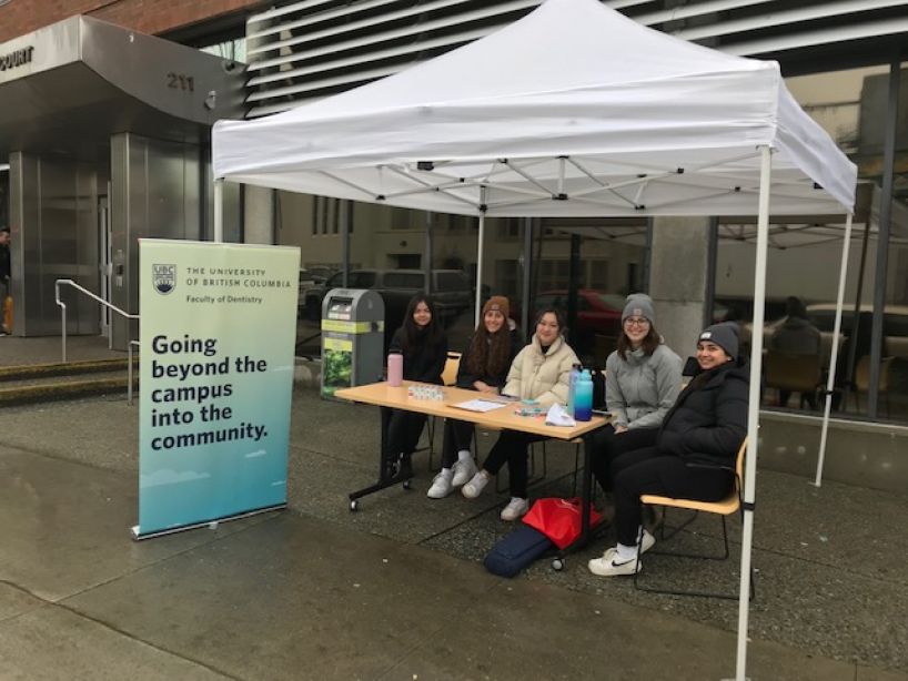 UBC Dental Hygiene Degree Program students at their information table outside Downtown Community Court on January 18, 2023