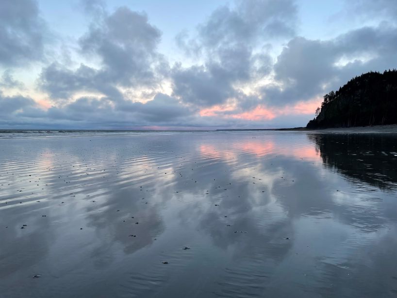 calm water, islands, cloudy sky with pink sunset