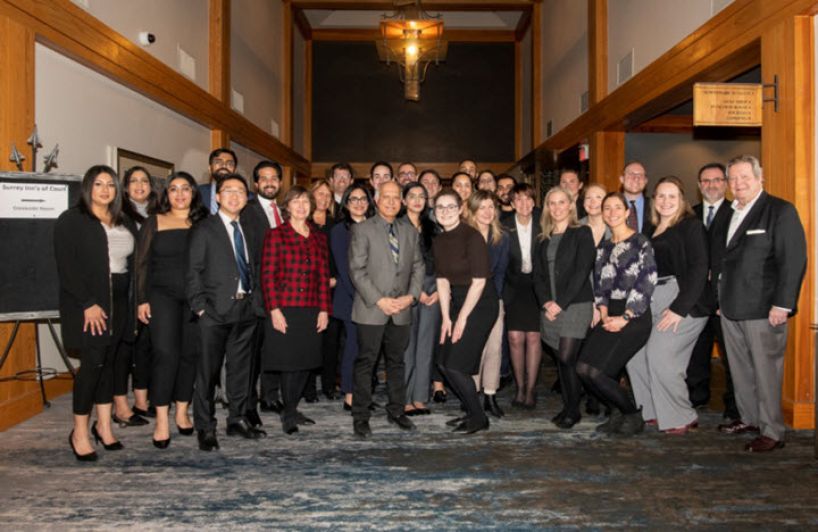 group photo of lawyers and judges